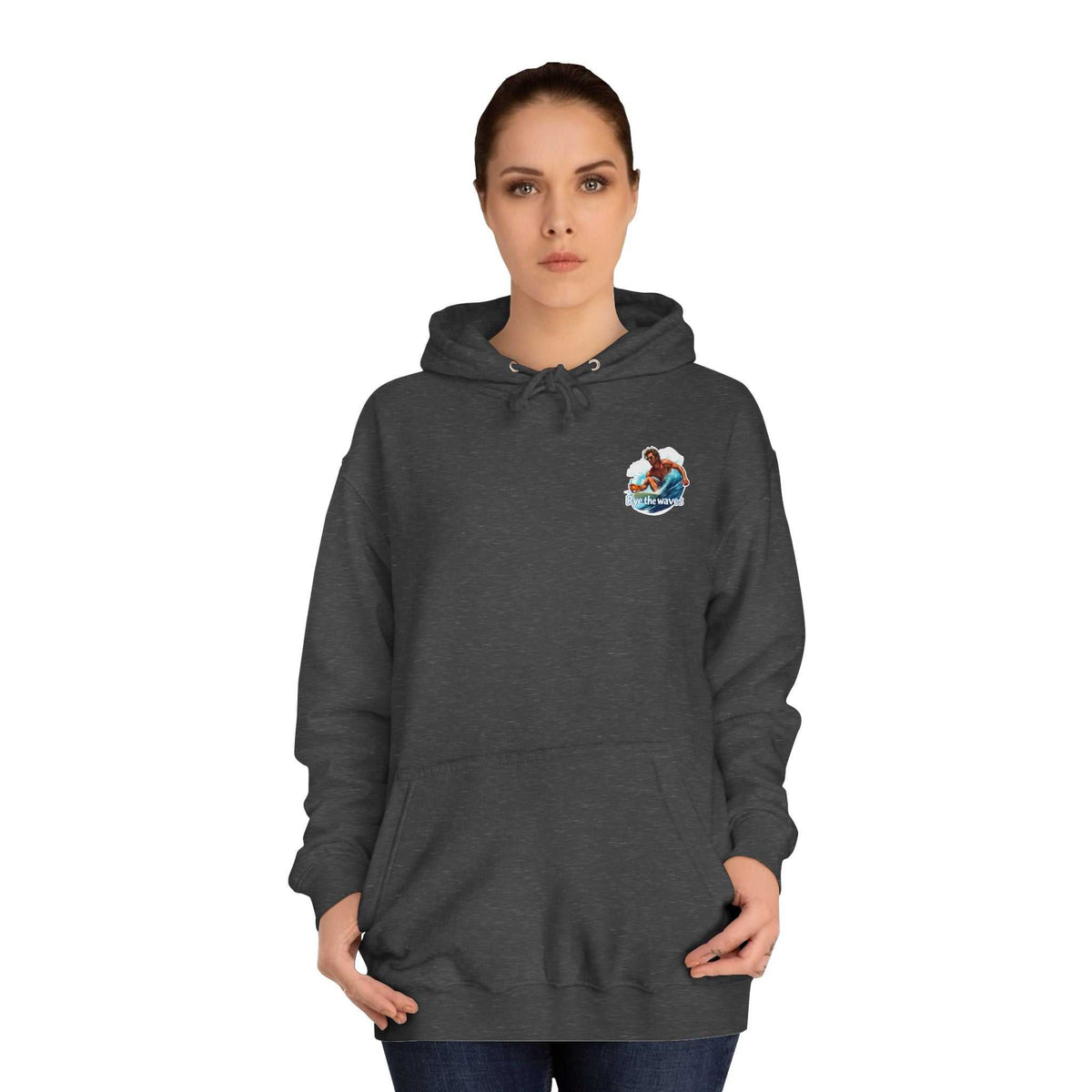 Woman wearing charcoal Surf Whiskey Hoodie with front graphic, highlighting oversized fit and cozy kangaroo pocket.