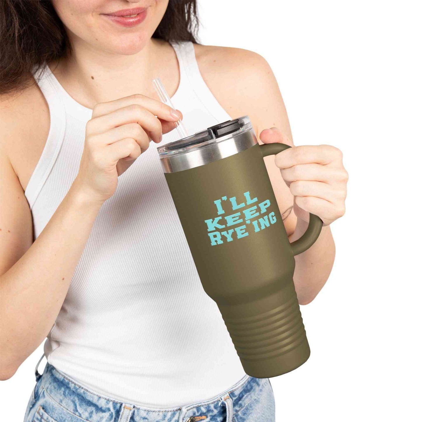 Olive green eco-friendly golf whiskey tumbler with 'I'll Keep Rye-ing' text, held by woman, great for stylish outdoor sipping.