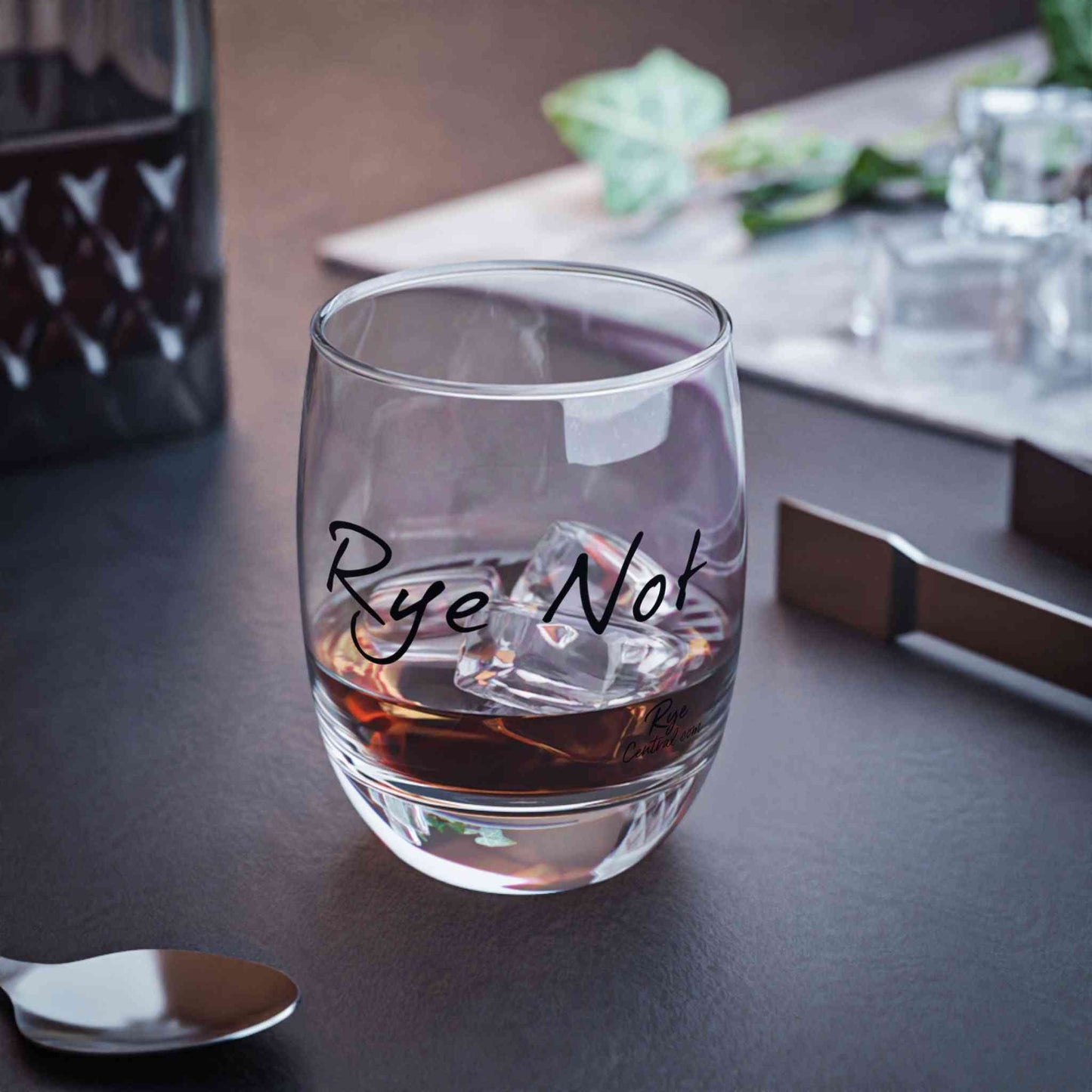 Funny Rye Not whiskey glass on a bar table with ice and whiskey, a perfect gift for drink lovers and barware enthusiasts.