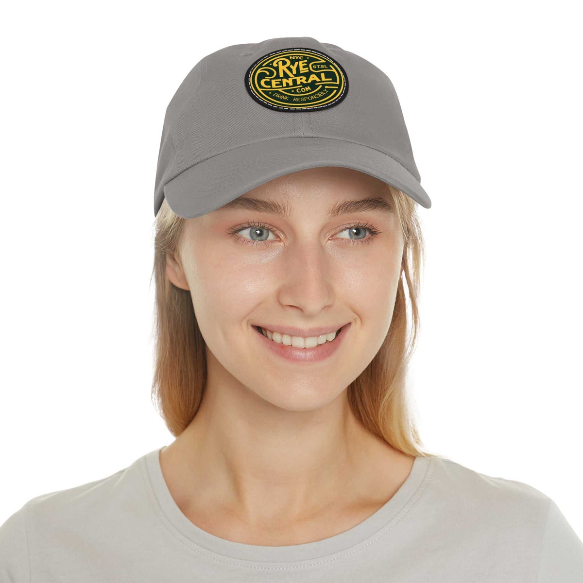 Model wearing gray Whiskey Leather Patch Dad Cap with Rye Central logo, a fashionable and functional choice for whiskey lovers.