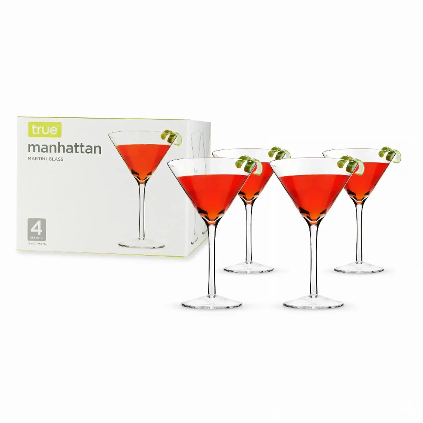 Elegant crystal cocktail coupe glasses with lime slices for home bar