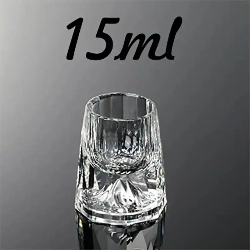 15ml crystal glass with geometric cut and clear base, designed for stylish whiskey or vodka shots in luxury bar settings.
