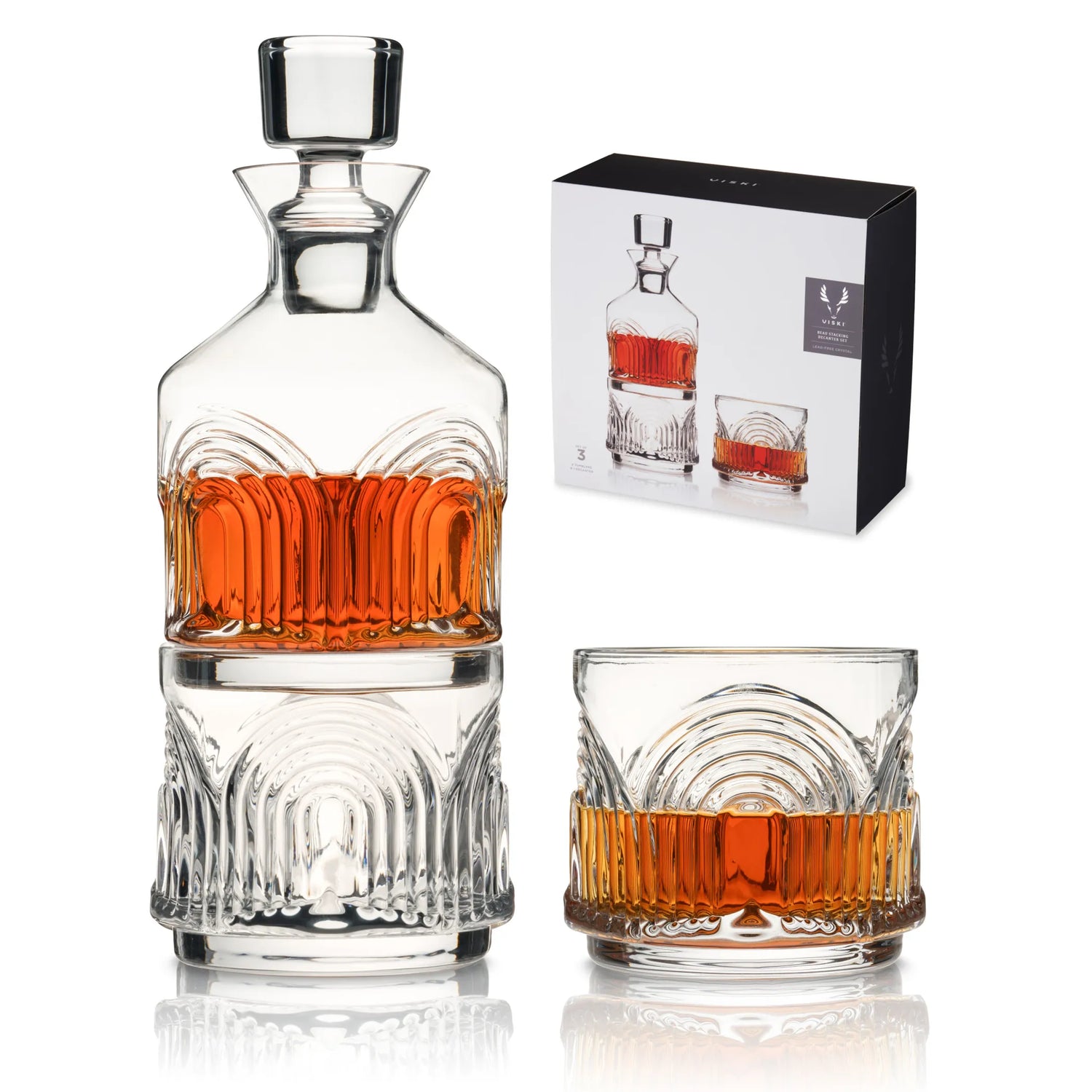 Elegant whiskey decanter set with matching glass and gift box.