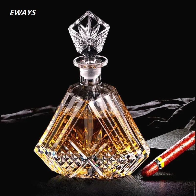 Elegant crystal whiskey decanter with geometric design and stopper.