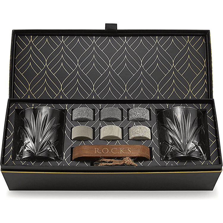 Elegant whiskey gift set with crystal glasses and chilling stones.