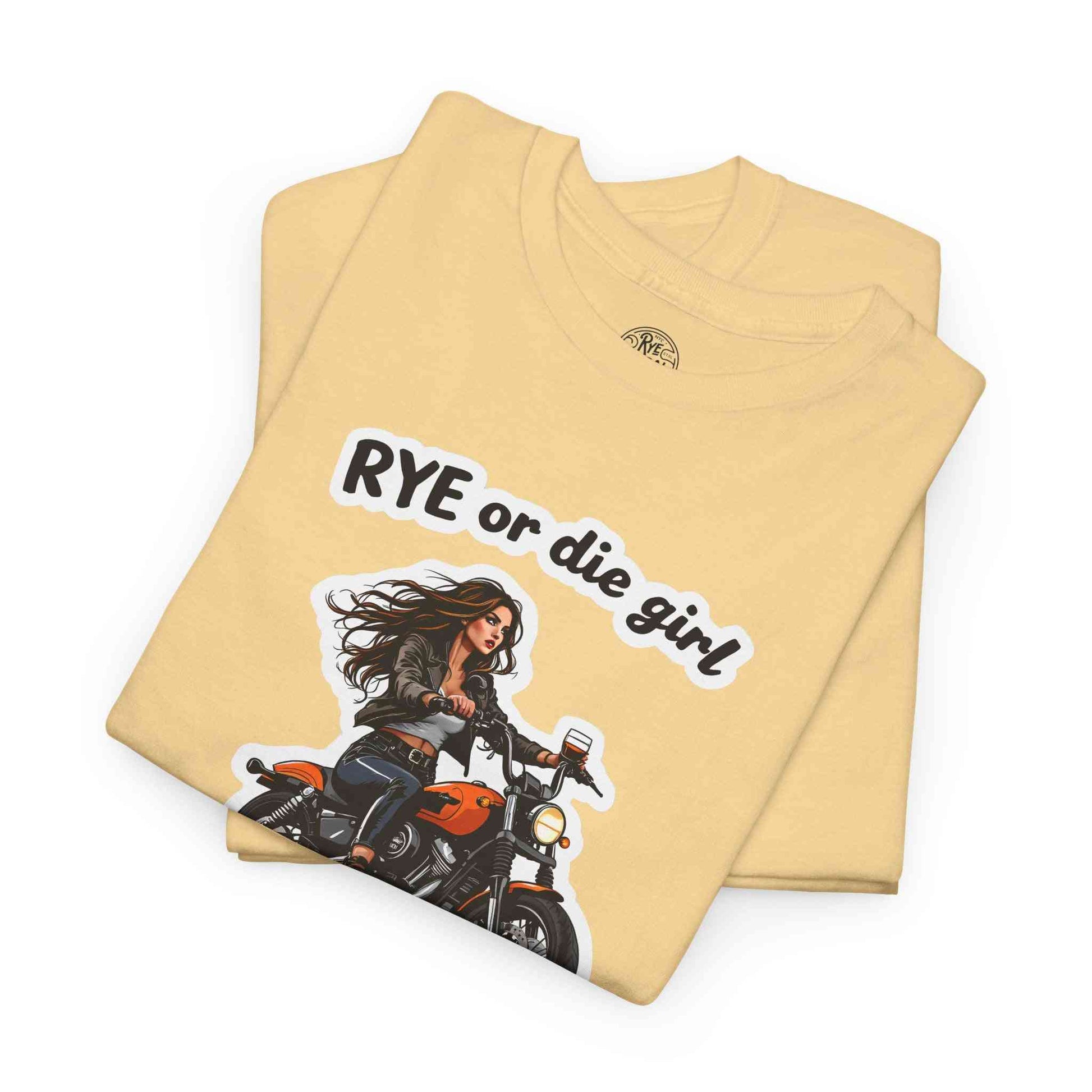 Folded funny whiskey shirt with 'Rye or Die Girl' text and biker girl graphic, perfect gift for whiskey lovers and bold fashion statements.