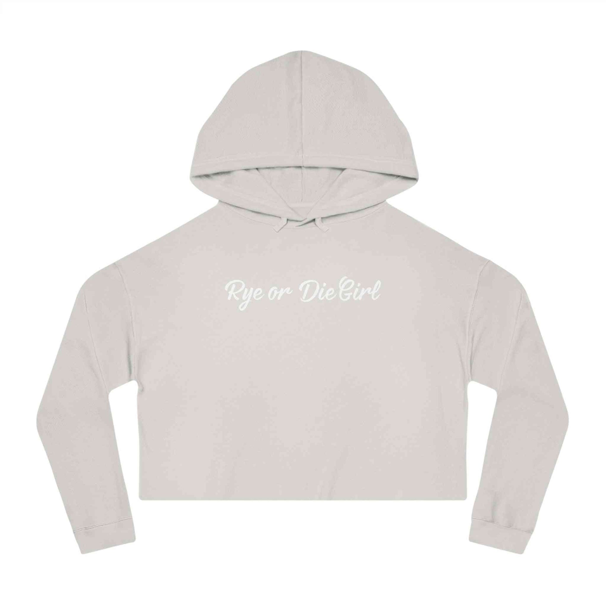 Flat lay of cropped whiskey sweatshirt hoodie in off-white with 'Rye or Die Girl' script, ideal for cozy, stylish layering.