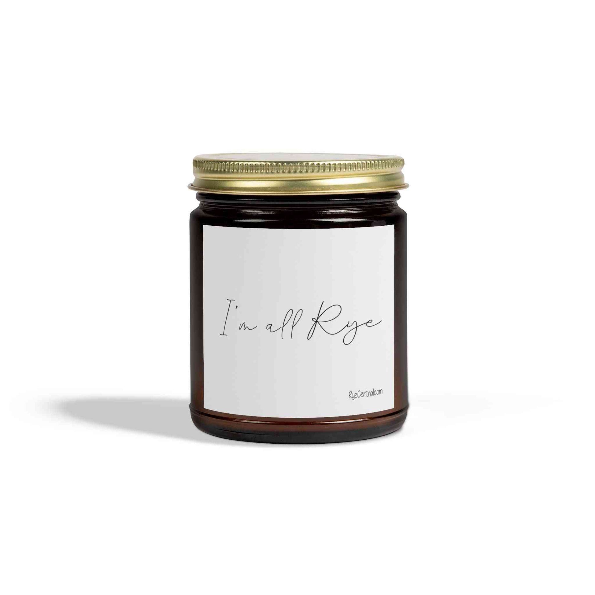 Dark amber jar candle labeled 'I'm All Rye' with gold lid, a chic decorative candle gift for whiskey fans and home decor.