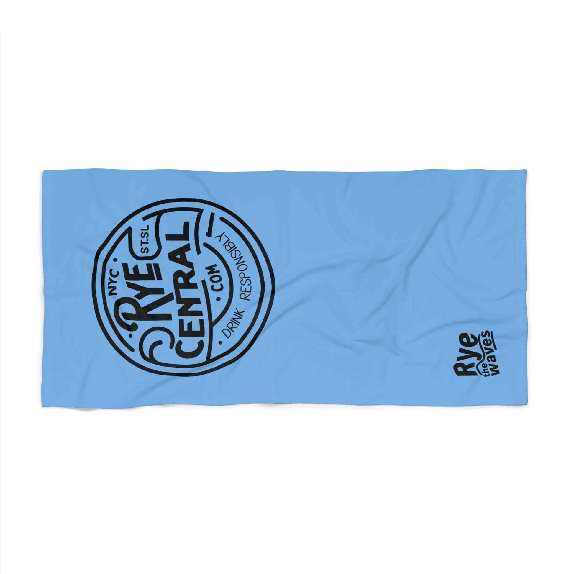 Flat lay of the Fun Rye Whiskey beach towel featuring bold black RyeCentral.com logo on blue microfiber, ideal for beach or bath use.