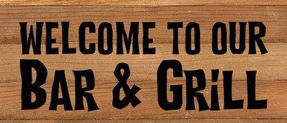 Welcome to our bar & grill wall décor sign features a wood background and bold lettering, ideal for accenting home or patio spaces.