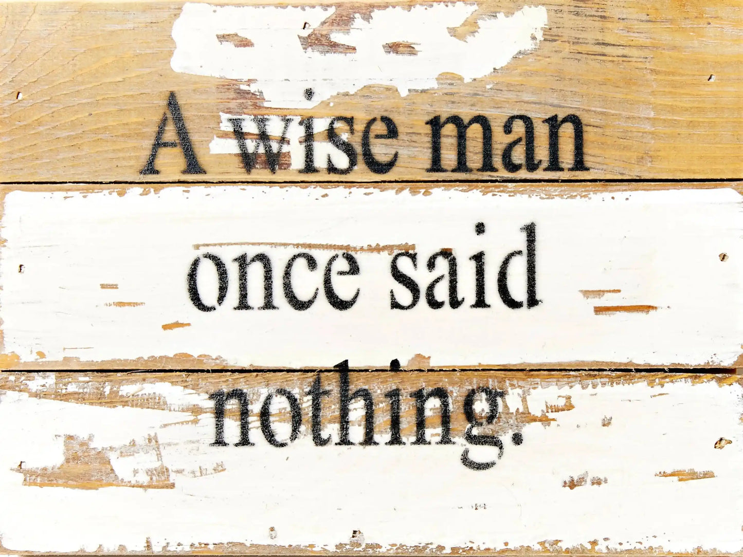 Distressed white and wood-tone novelty sign with 'A wise man once said nothing' quote. Reclaimed wood wall décor for home charm.