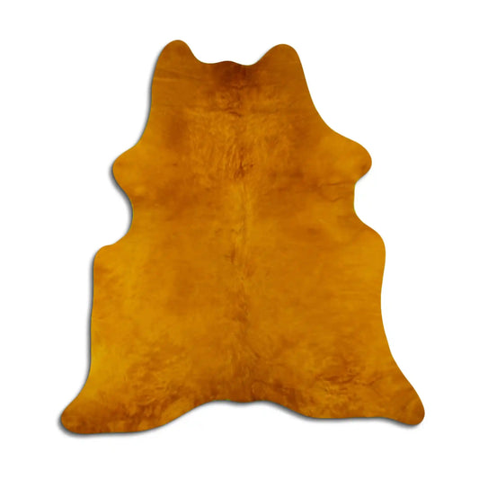 DYED HAIR ON COWHIDE DYED YELLOW rug with rich amber tone and natural hide shape, ideal for rustic or modern home décor.