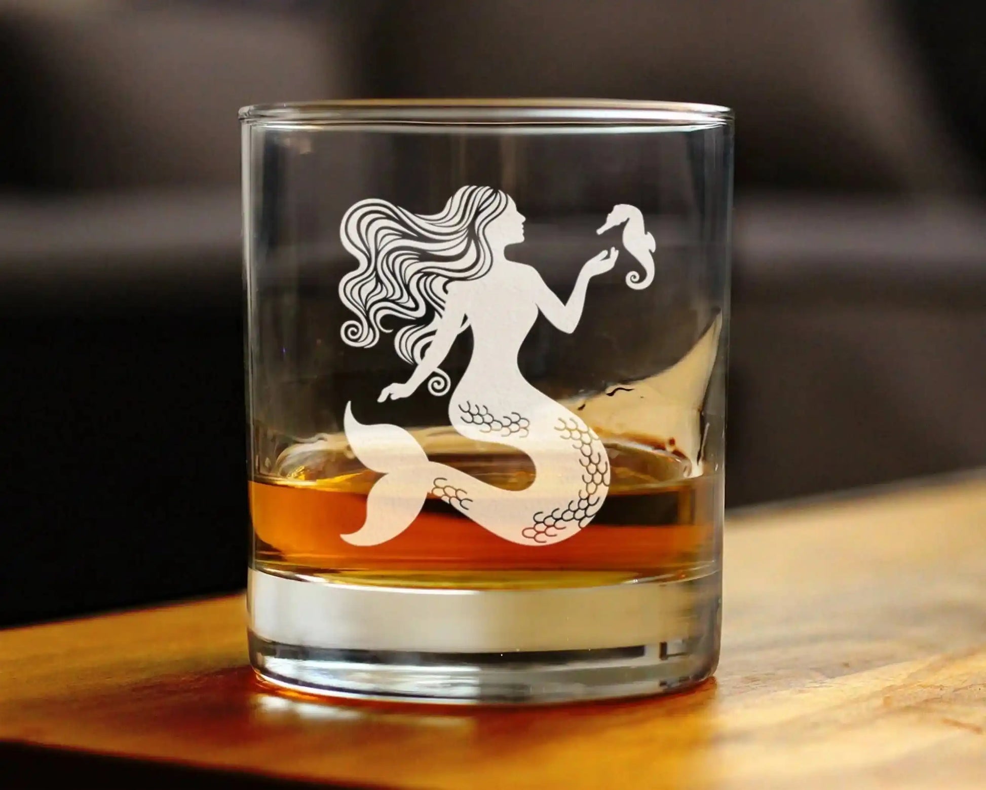 Mermaid Whiskey Glass filled with bourbon, showcasing its beach-themed etched design, perfect for coastal parties and stylish home bars.