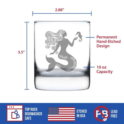Product diagram of Mermaid Whiskey Glass showing 10 oz capacity, 3.5 inch height, and hand-etched design, dishwasher safe and lead-free.