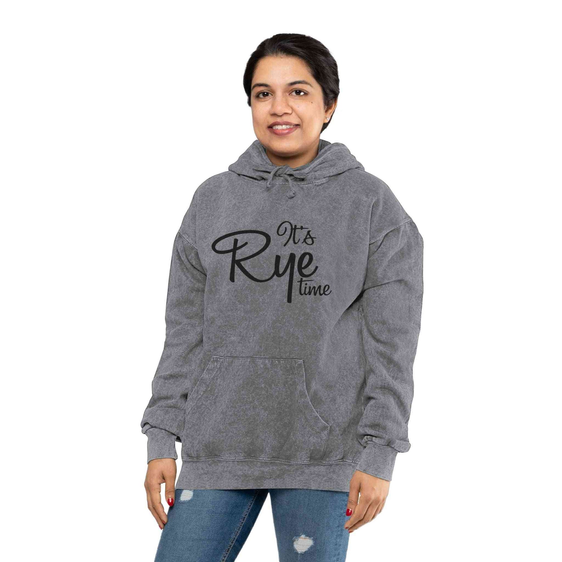 Unisex Mineral Wash Whiskey Hoodie in gray with 'It's Rye Time' text, modeled for cozy everyday wear and whiskey-themed gifting.