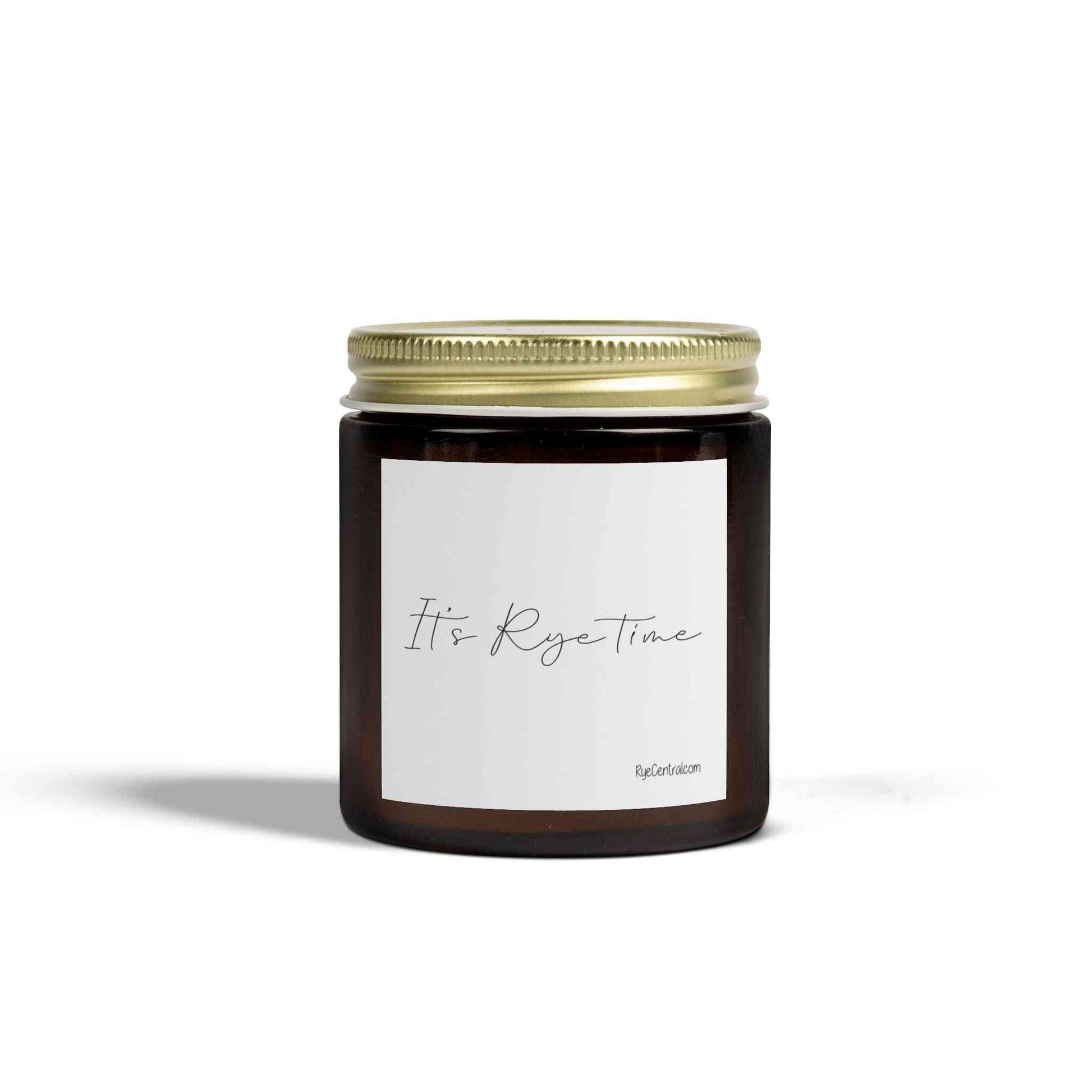 Amber glass 'It's Rye Time' scented candle with minimalist label, ideal whiskey-themed gift for luxury home decor settings.