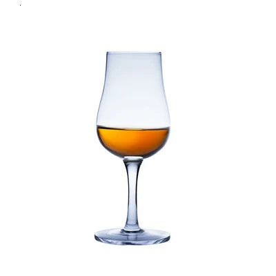 Single whiskey glass with whiskey