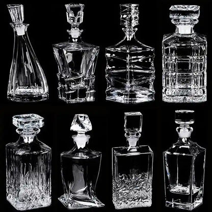Collection of 8 empty crystal glass liquor pourers in modern and classic styles, perfect for whiskey, wine, and vodka display.