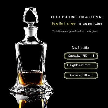 750ml elegant crystal glass decanter with curved base and pointed stopper, perfect for wine or whiskey storage.
