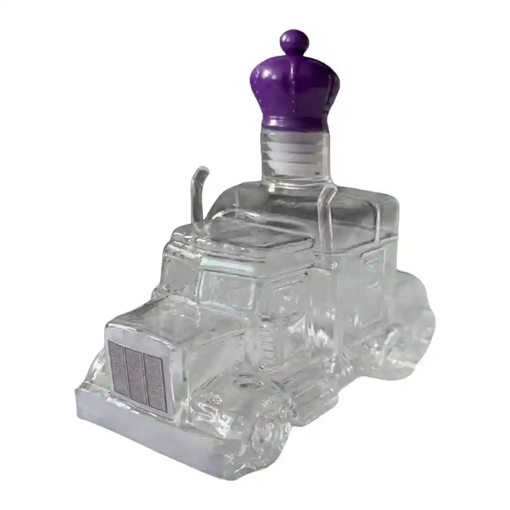 Transparent glass truck-shaped decanter with purple crown stopper, offering a bold and whimsical touch to bar décor.