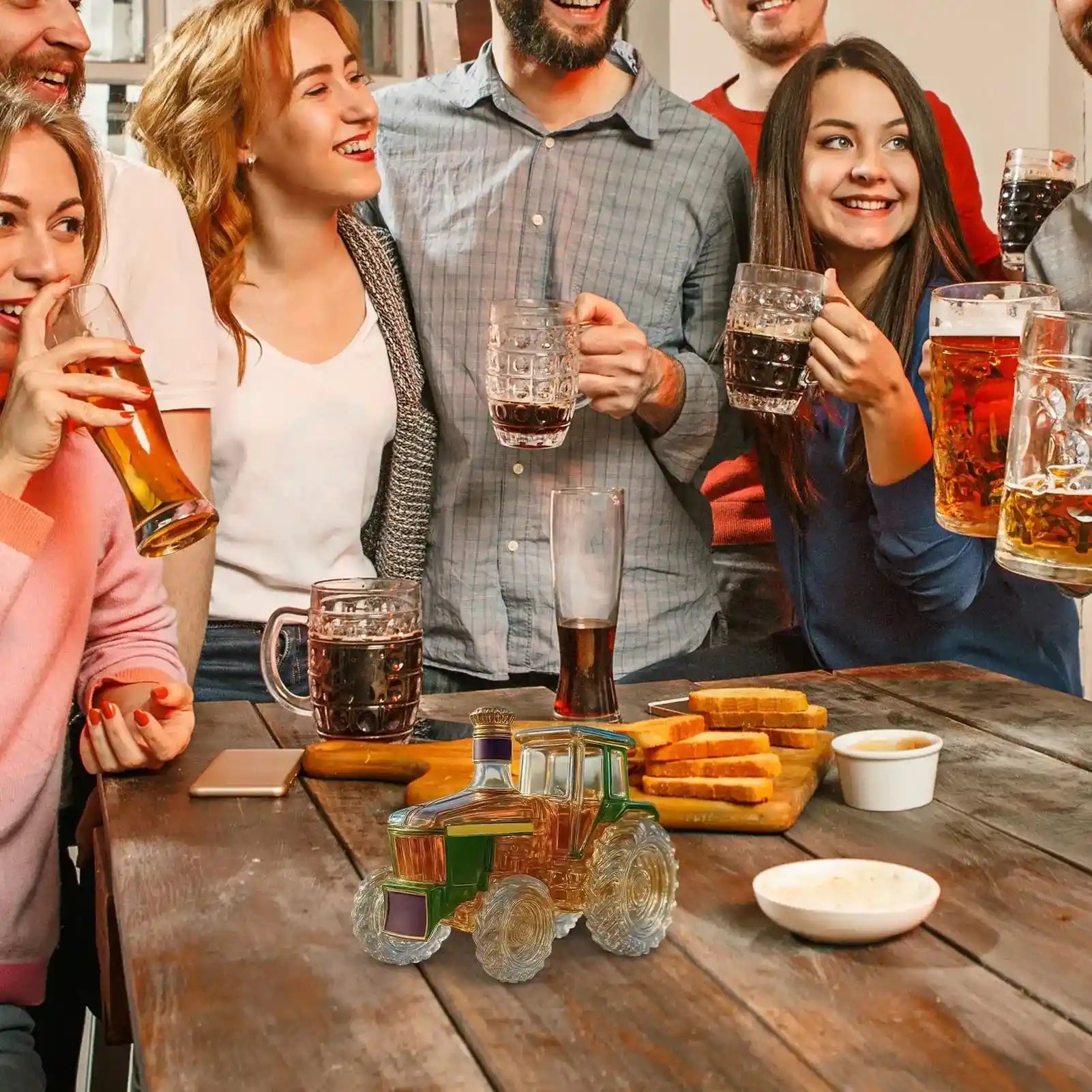 Green Glass Tractor Decanter on a party table with friends toasting beer, blending fun and function in home bar décor.