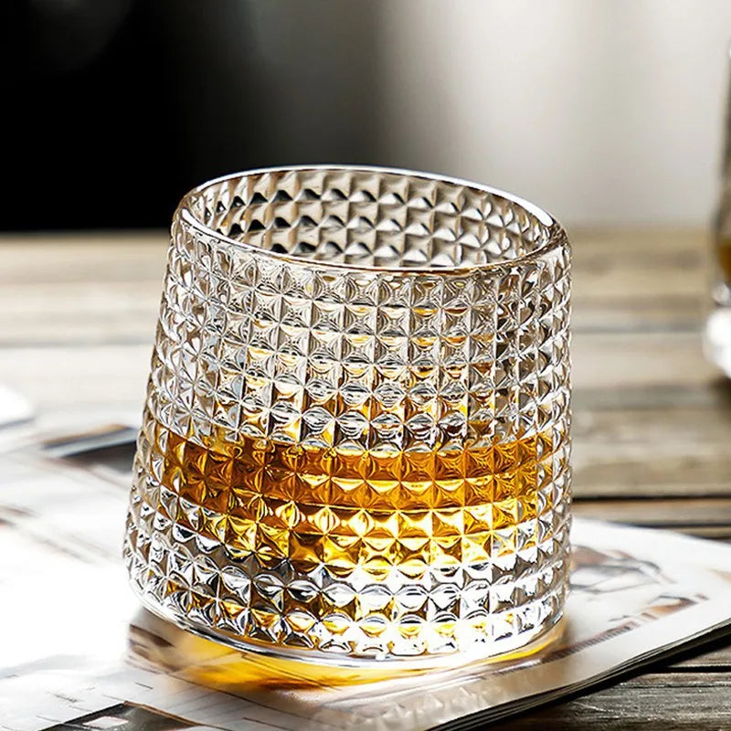 Close-up of patterned whisky glass with drink