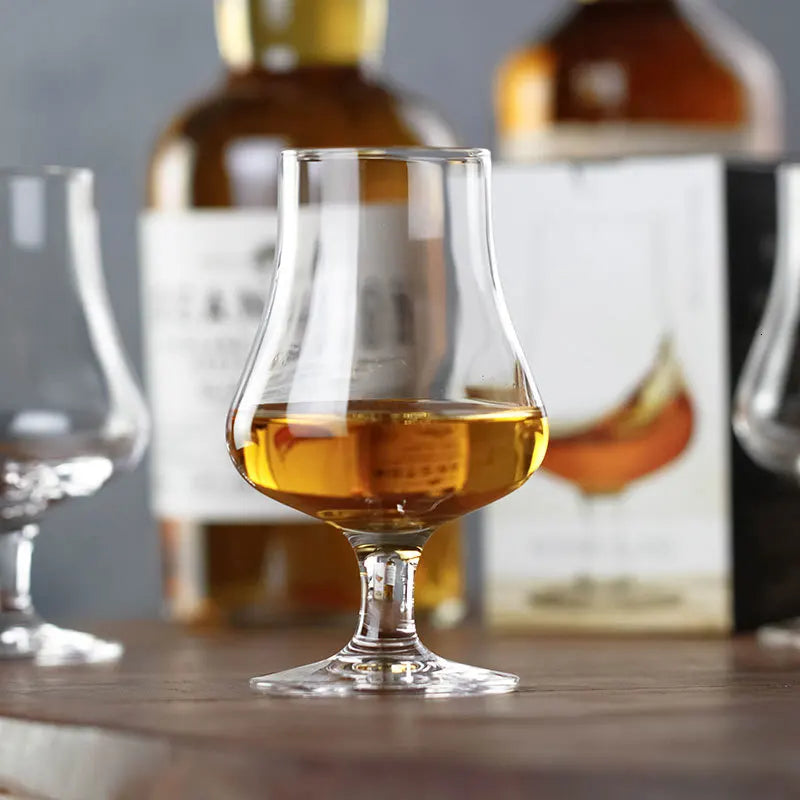 Whisky glass with amber liquid, Stölzle Crystal Nosing Glass