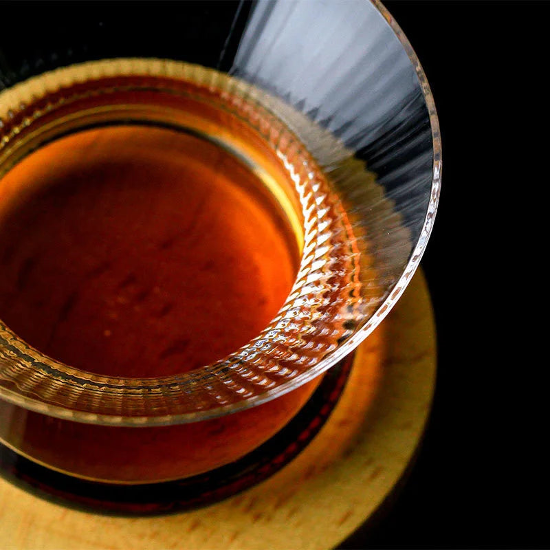 Top-down view of HANYU Edo Kiriko whiskey glass with rye whiskey showing amber tones and crystal cut detail