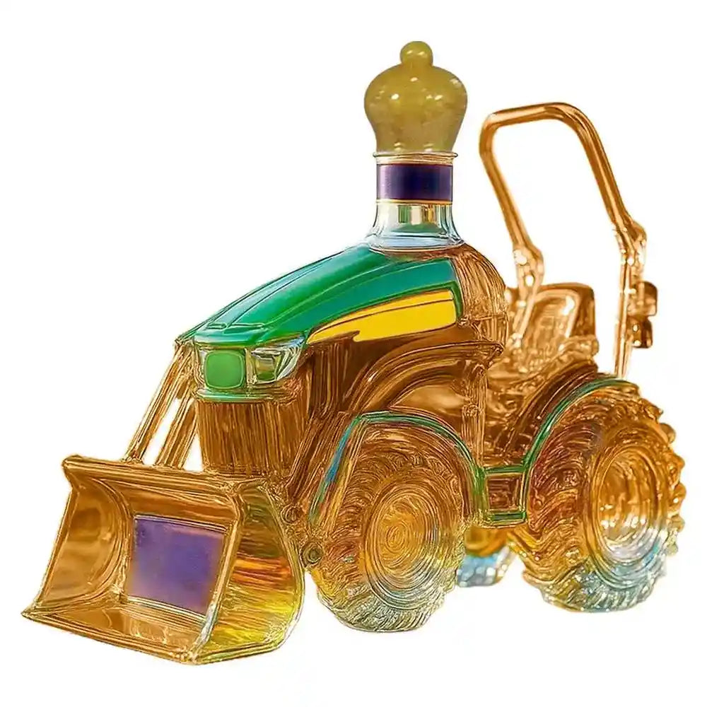 Golden glass tractor decanter with loader and crown top, ideal for whiskey serving and standout home bar décor.