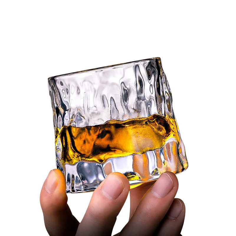 Elegant whisky glasses with amber liquid