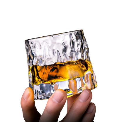 Elegant whisky glasses with amber liquid