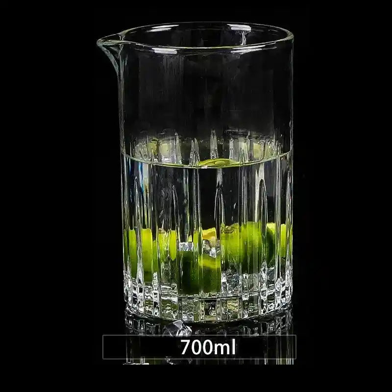 Clear 700ml crystal stirring cup with vertical cuts and limes, perfect for cocktail preparation and whiskey mixing.