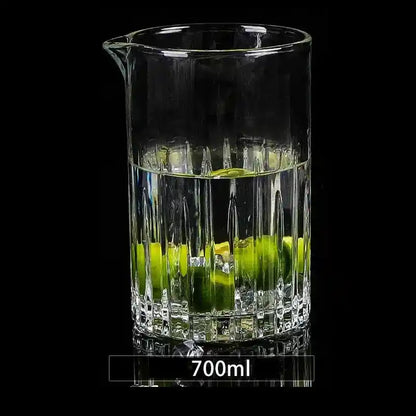 Clear 700ml crystal stirring cup with vertical cuts and limes, perfect for cocktail preparation and whiskey mixing.