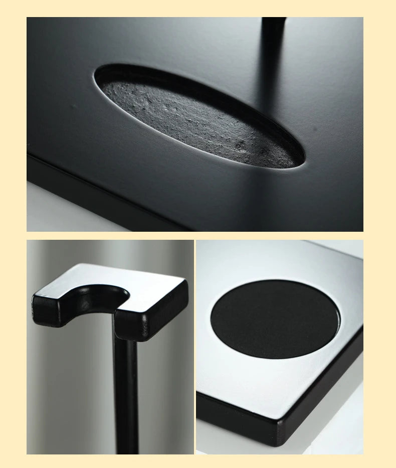 Close-up of black decanter stand and coaster
