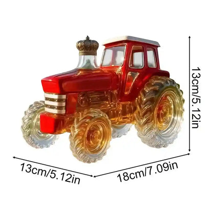 Red glass tractor decanter with gold accents and crown top, 13x18cm, a stylish whiskey server and decorative bar piece.